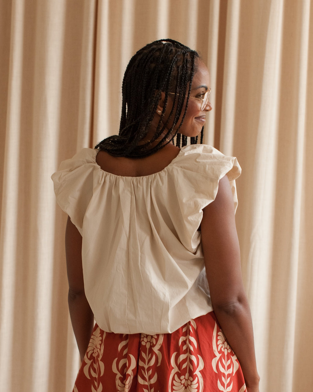 Bubble Hem Cap Sleeve V-Neck Blouse