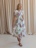 Geblümtes Kleid mit Smokdetails